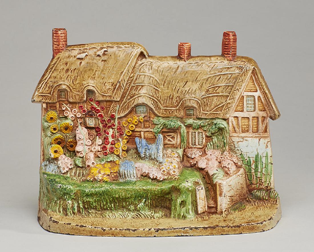 Cast Iron Figural Anne Hathaway House Doorstop: Figural cottage door stop is in good condition, small .1/2" chip on bottom-right at back corner of base. Measures 6-1/2" high.