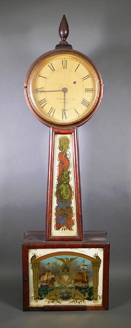 Banjo Wall Clock Constitution Guerriere A Willard: Antique 19C wall clock, reverse painted front and door. Depicts battle between Constitution and Guerriere. Face signed "A Willard Sr. Boston." Face is almost certainly a replacement. Hour hand does no