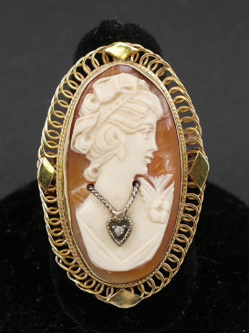 14k Gold Victorian Shell Cameo Ring: Woman is wearing a diamond pendant. Size 8. Weighs 7 grams total.
