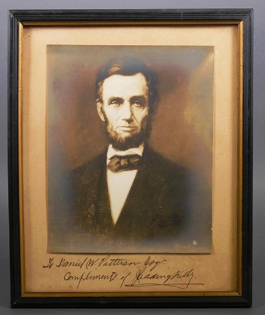 Portrait of Lincoln by J. Redding Kelly Signed: Photograph of Lincoln portrait, marked lower right with signature of J. Redding Kelly (American, 1868-1939), and hand signed and inscribed below the mounted photo "To Daniel W. Patterson, Esq., Compli