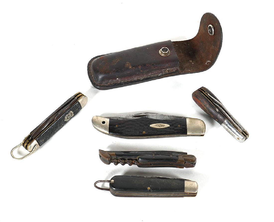 5 Vintage Pocket Knives, incl Boy Scout, Case XX: Tray lot of five pocket knives, mostly from WWII era and earlier. Includes Case XX 6165, Camillus and Barlow. Also old Schrade leather holster. Conditions vary. See images for detail.