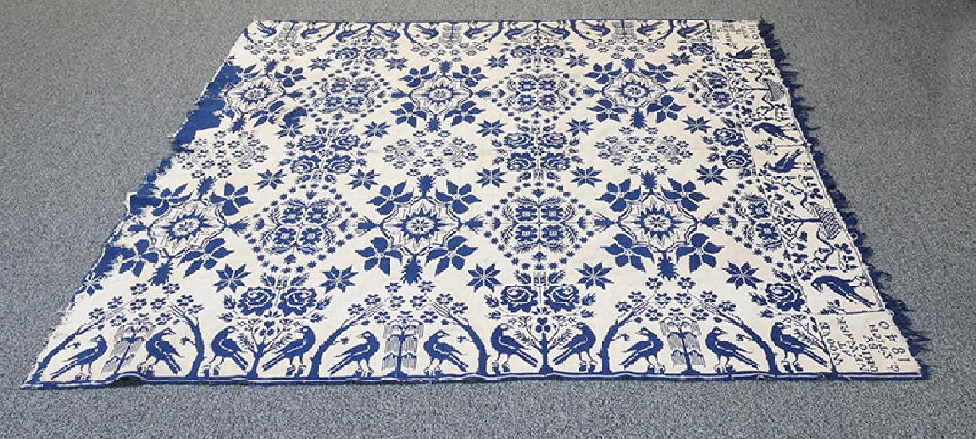 Antique 1840 Ohio Jacquard Woven Coverlet Signed: Early 19C navy blue and tan coverlet, signed and dated 1840. Measures about 80" x 72". Has some wear, holes and a few repairs, primarily on tan-on-blue side. Depicts birds, urns and trees. Signed on t