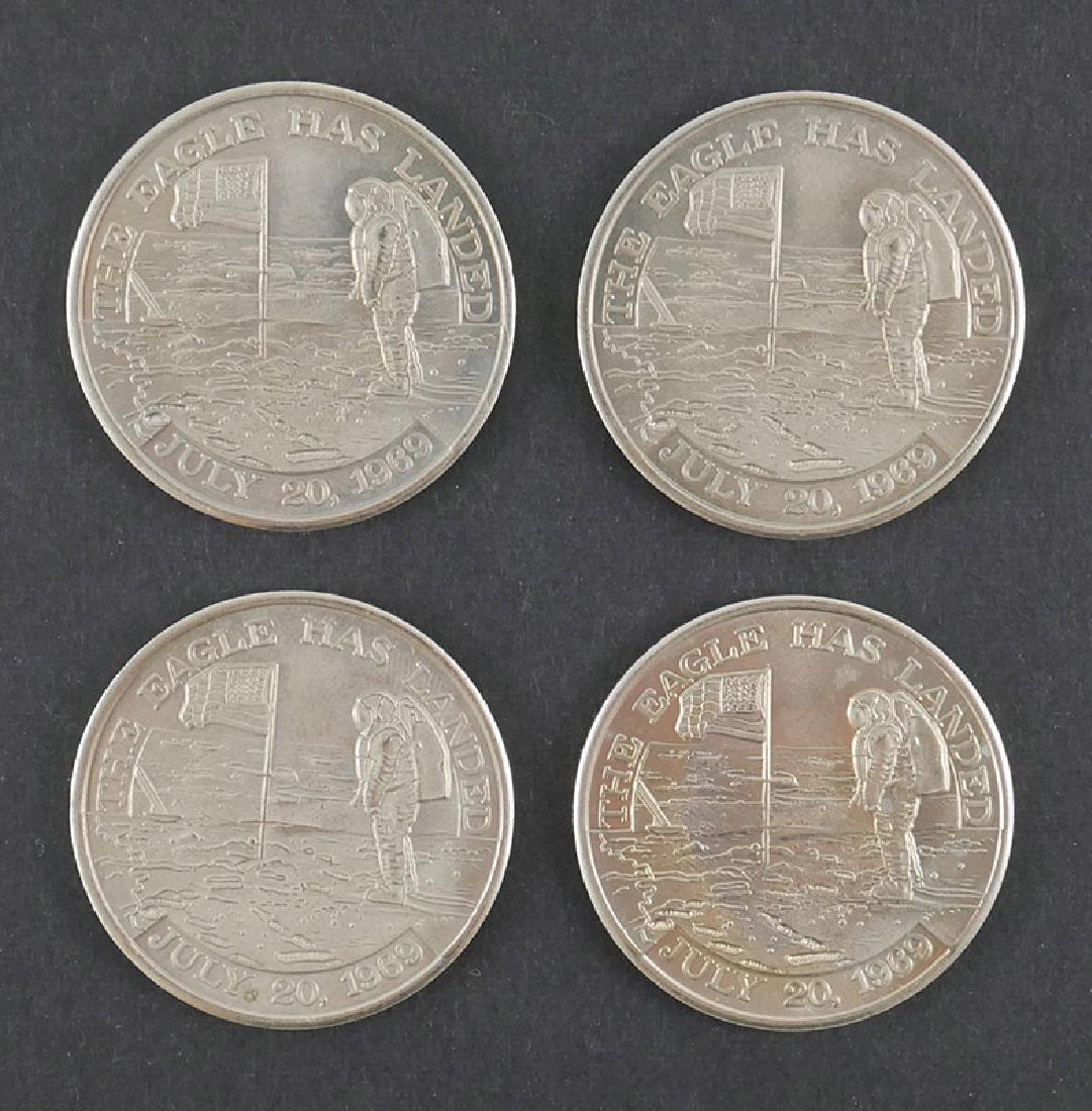 Set 4 APOLLO 11 Flight Awareness Coins SPACE FLOWN: Four medallions commemorating the Apollo 11 mission from the collection of a NASA employee and associate of Wernher von Braun. Each medal is well-struck on both sides. One side reads "The Eagle Has La