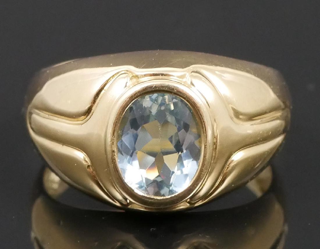 18K Men's Aquamarine Ring: Antique men's ring with gypsy set stone. 6 grams. Size 8.