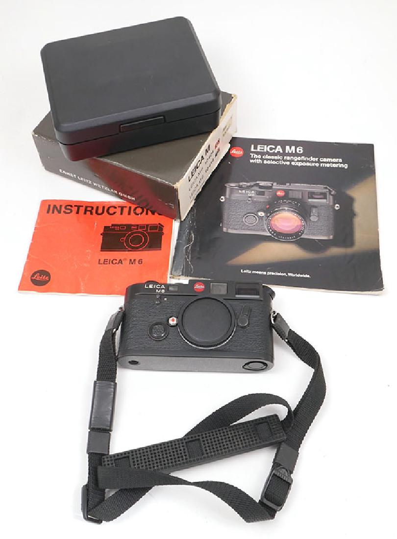 Leica M6 Classic 35mm Rangefinder Camera MIB: Leica M6 classic black camera body, SN 1657807 comes with original Leica neck strap, body cap, presentation case plus all of the original packaging, Instruction Manual and paper documents. Pristine co