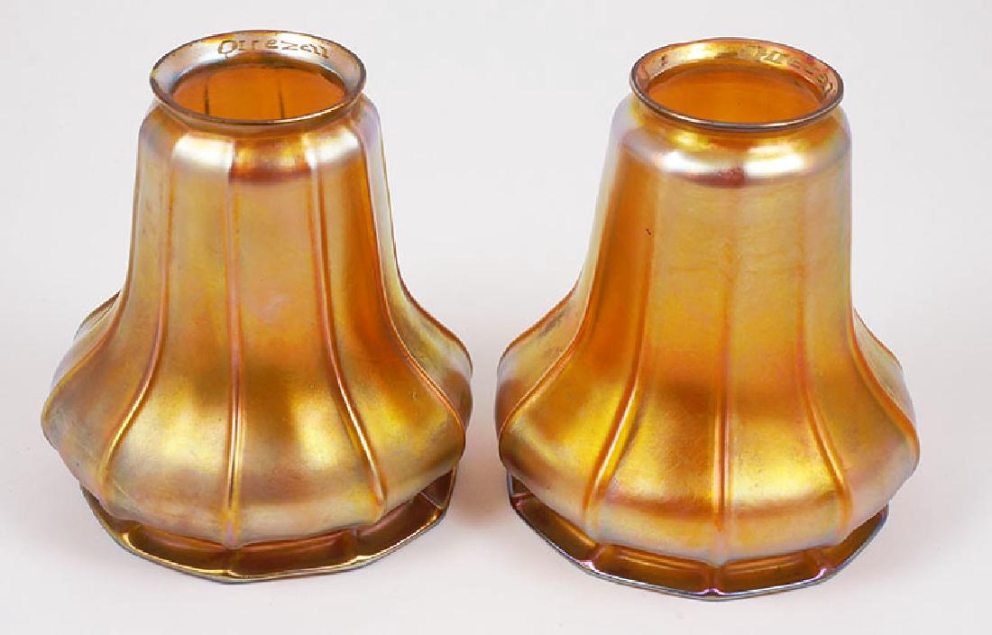 Pair of Quezal Iridescent Signed Art Glass Shades: Two superb iridescent Quezal glass shades. 5" high. 2" flange. Both signed on the flanges. No damage at all.