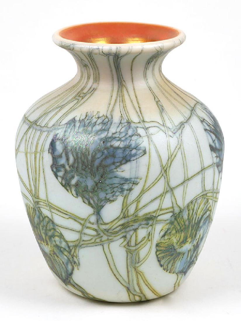 Iridescent Art Glass Floral Vase attr Loetz: Bohemian art glass vase with stylized floral design and iridescent, aurene inside. Measures 5-3/4" high. Excellent condition, with no damage.