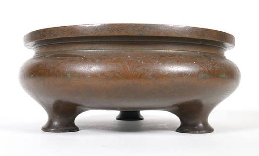 Antique Chinese Bronze Footed Planter: Antique Chinese bronze with incised design. Signed underside. Good condition. Measures 3-1/4" tall, 7-1/2" in diameter.