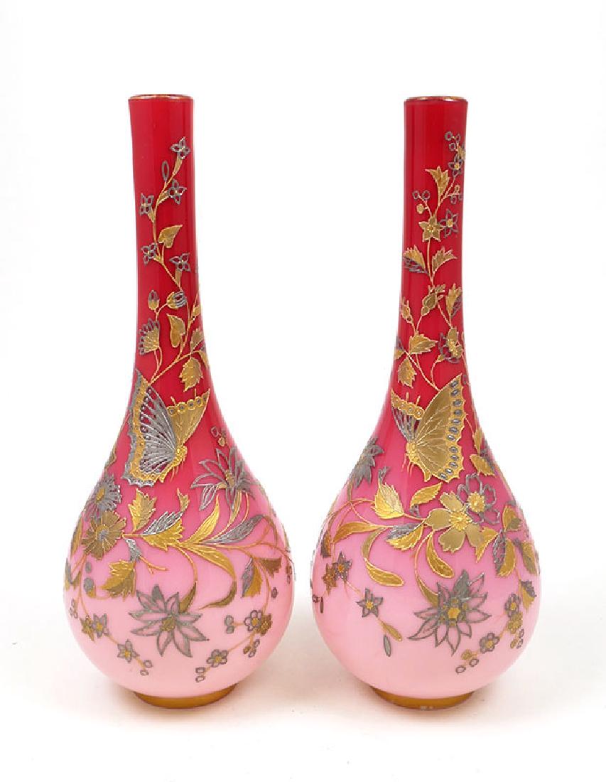 Pair Victorian Peach Blow Vases Thomas Webb: Pair of exquisite peachblow hand painted vases attributed to Thomas Webb with butterfly and floral decoration with gilt accents. Excellent condition. Each measures 10" tall.