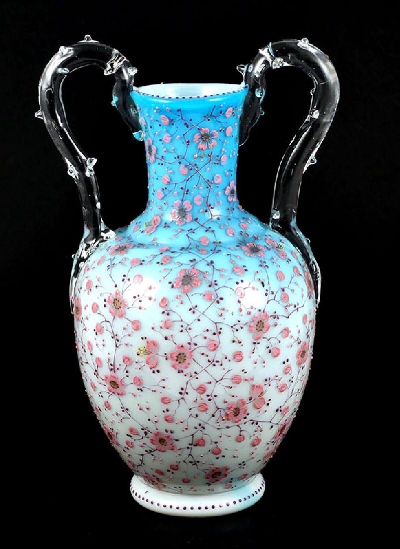 Victorian Enameled Webb Art Glass Handled Vase: Antique Thomas Webb handled vase with enameled floral decoration and applied clear glass handles with thorn motif. Unsigned but bears a mold number 6162 on the underside. Good condition. Measures 9-3/