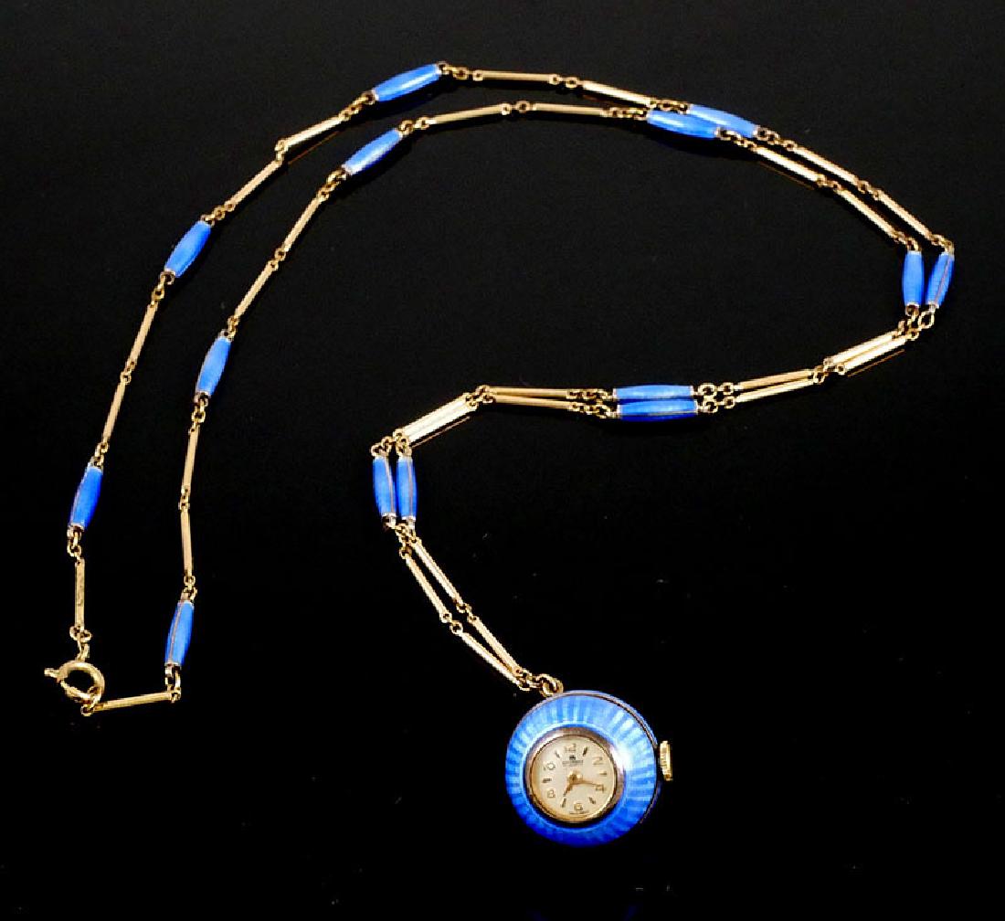 Vintage Bucherer Pendant Guilloche Ball Watch: Running Bucherer Swiss-made, 17-jewel, ball watch with guilloche enamel case and chain accents. Chain measures 32" long, watch about 3/4" diameter. Good condition.