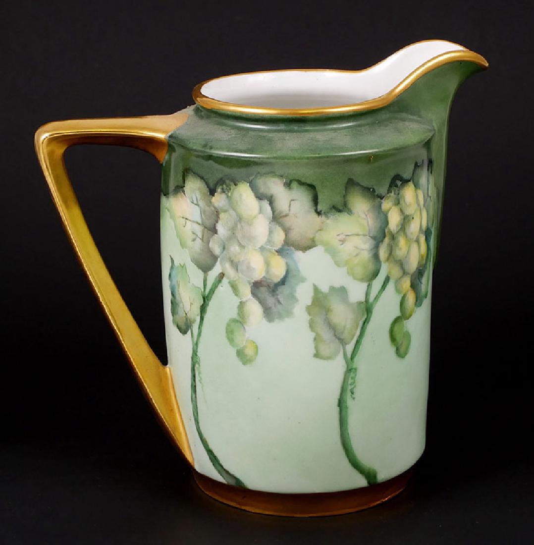 Limoges Hand Painted and Signed Grapes Pitcher: Antique artist-signed handpainted and gilt jug, measuring 7-1/4" high, most likely Limoges, but unmarked. Excellent condition, circa 1910.