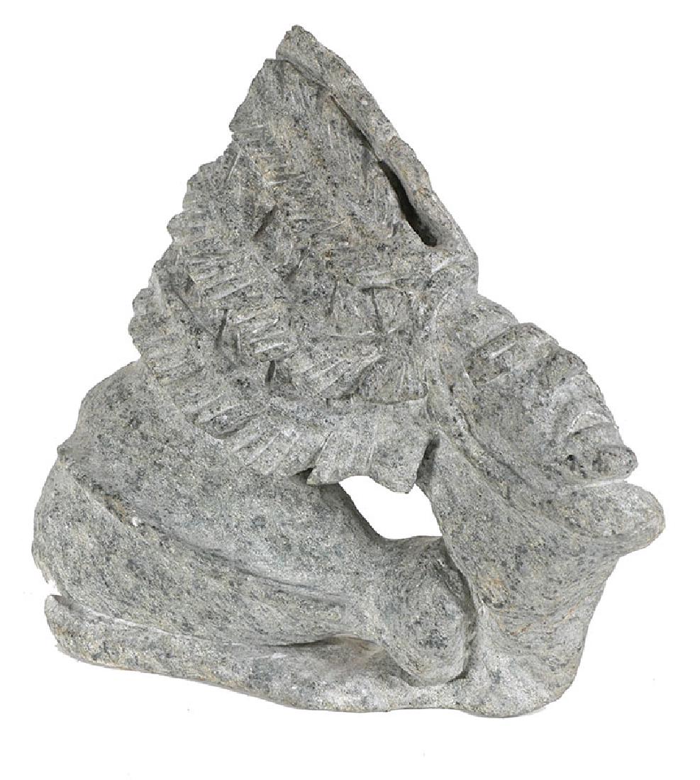 Eskimo Shaman Stone Carving Signed Bart Hanna: Dramatic carving of shaman, signed "B. Hanna" on the bottom. Bart Hanna (also known as Kappianaq), is from Igloolik, Nunavut, Northern Canada. Base still has Eskimo "Igloo Tag" on the bottom.