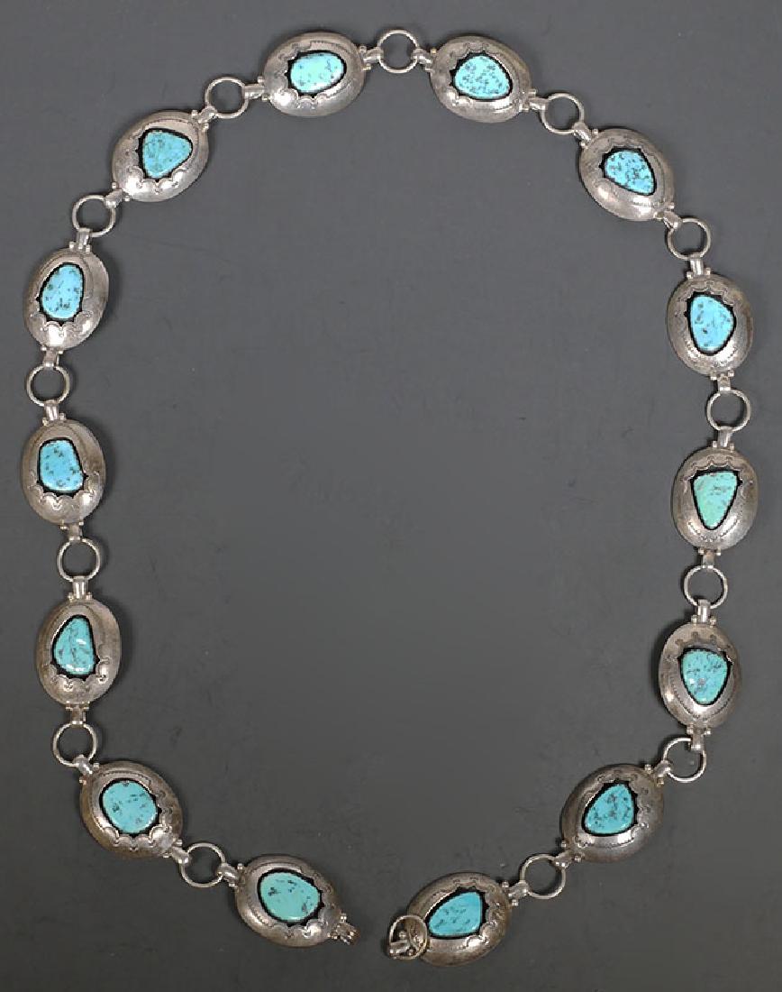 Sterling & Turquoise Shadowbox Belt Teddy Goodluck: Sterling silver and turquoise shadow box belt. Signed "By Teddy Goodwin Navajo" with Teddy Good Luck clover hallmark. Measures approx. 36" long. Excellent condition. Weighs 187.1 grams.