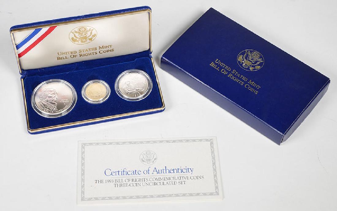 1993 U.S. Bill of Rights Gold and Silver Coin Set: Silver dollar, silver half dollar and $5 gold coin in original box and case, including United States Mint paperwork.