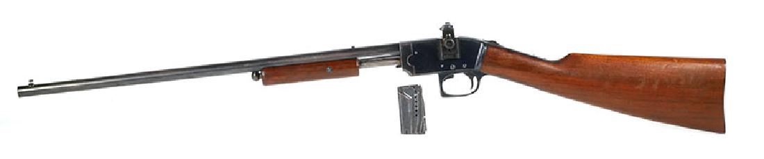 Savage Model 1909 Pump Action .22 Rifle: Savage Model 1909 pump action .22 rifle. Nice condition. Old adjustable Lyman peep sight. Good action. Light finish wear. Undamaged wood has little wear. RARE Original magazine. Please note: C&R okay.