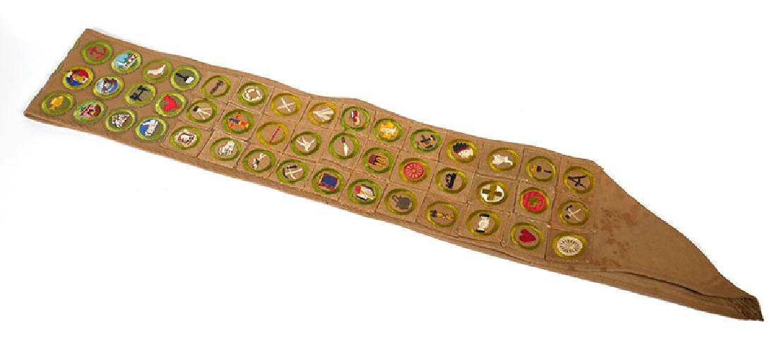 Rare Early Boy Scout 33 Type A Merit Badges Sash: BSA sash with 33 Type A merit badges (aka "Squares") and 25 Type E badges. Apparently someone decided to add some later (1947-1960) badges to a sash with much older badges (1911-1933). Some spots near