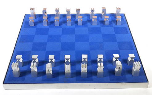 Austin E. Cox Modernist Chess Set 1960s Aluminum: By Austin Enterprises, circa 1966. Extruded aluminum pieces in wooden case with blue plexiglass cover. One player plays plain aluminum pieces, the other plays pieces that are anodized bronze along the