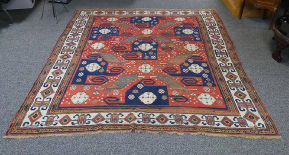 Kurdish Tribal Hand Tied Rug 93" x 77": Kurdish tribal hand tied rug, beautiful geometric borders. Red field with cobalt design and ivory natural tassels. 80-100 KPSI. Measures 93" x 77".