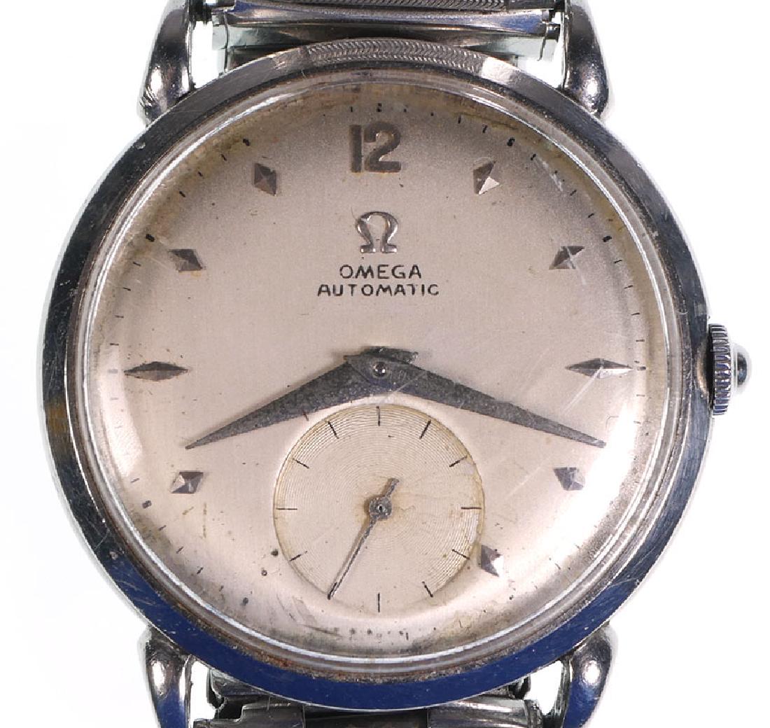 Vintage Omega 1950s Watch Automatic 342 Bumper: Working vintage Omega stainless steel watch from early 1950s with 342 bumper movement. Case measures about 1-1/4" diameter. Dial has some wear mostly near bottom. Crystal is scratched. Watch runs when