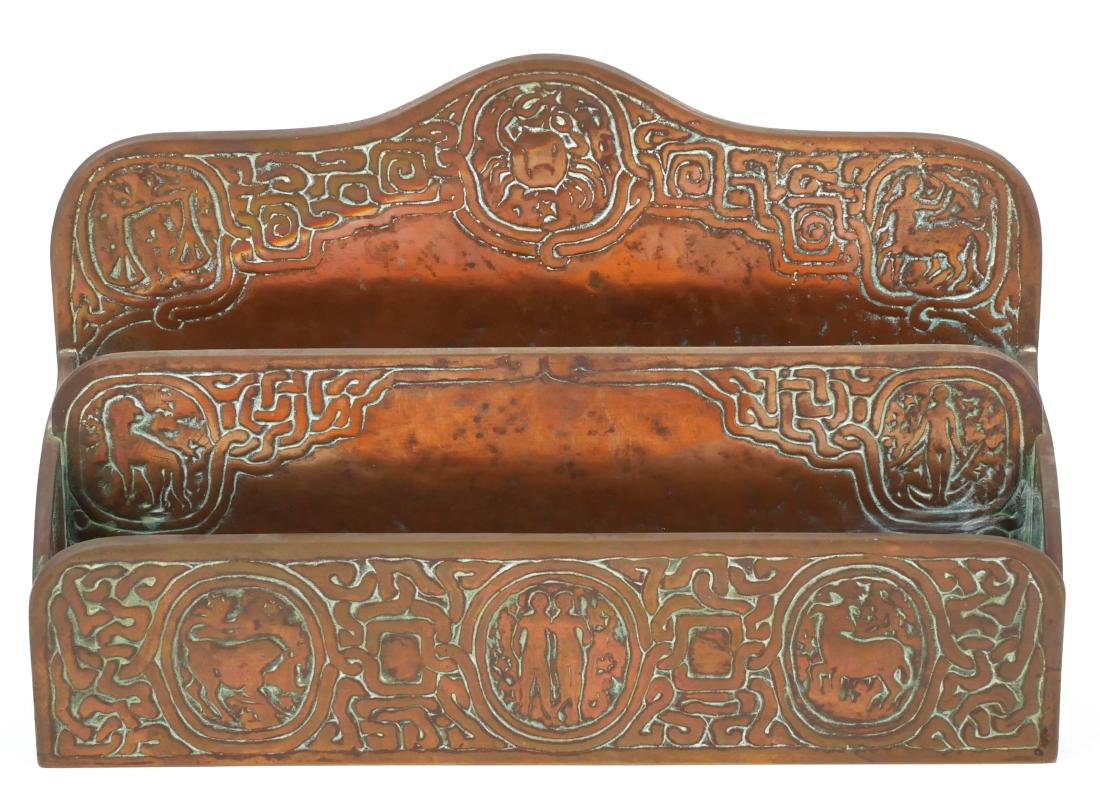 Tiffany Studios Zodiac Bronze Letter Holder: Part of a Tiffany Zodiac pattern desk set being offered in today's auction. Bronze letter holder/sorter. Measures 9-1/2" long, 6-1/4" high. Very good condition -- some verdigris in pattern and worn pa