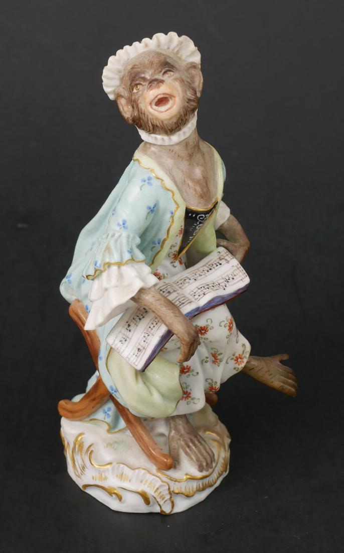 Meissen Porcelain Monkey Band Singer: Singer from Meissen monkey orchestra. Measures about 5" high. Professional repair of right foot. Crossed swords mark.