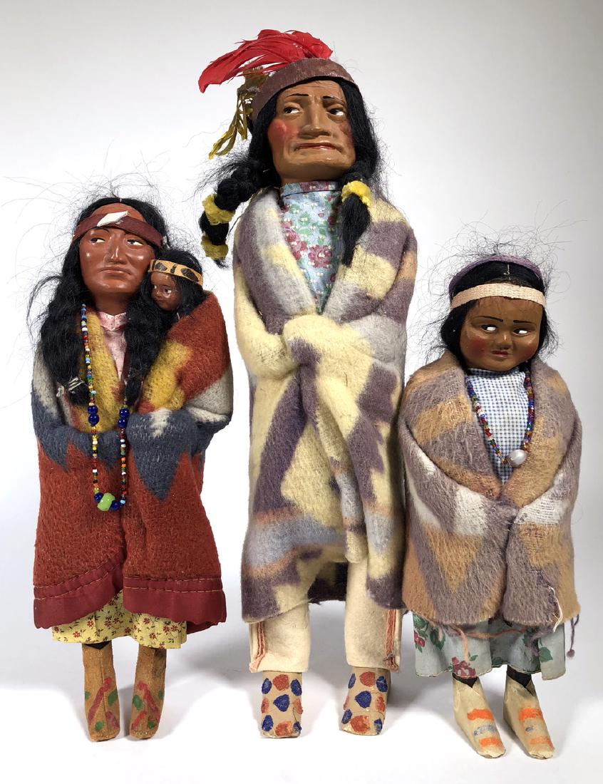 3 Vintage Skookum Indian Dolls: Three vintage Skookum dolls measuring 14", 11" and 9-1/2". Good condition.