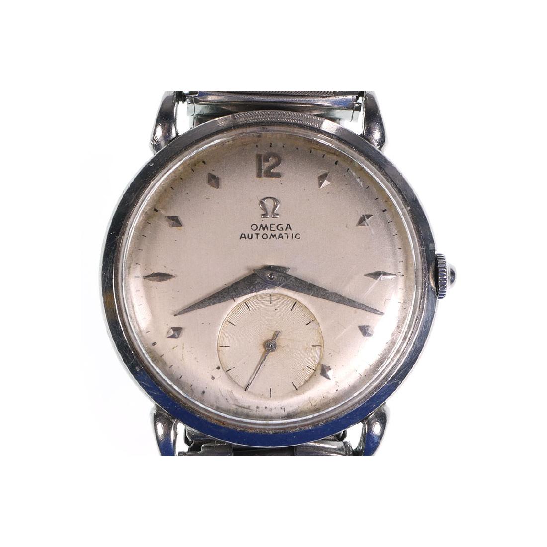 Vintage Omega 1950s Watch Automatic 342 Bumper: Working vintage Omega stainless steel watch from early 1950s with 342 bumper movement. Case measures about 1-1/4" diameter. Dial has some wear mostly near bottom. Crystal is scratched. Watch runs when