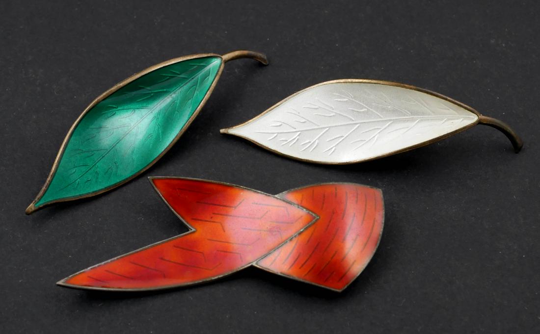 Three Scandinavian Foliate Enamel Brooches: Set of 3 vintage Norwegian sterling enameled brooches. All are sterling silver from Norway, two marked D-A for David Andersen. Largest approximately 2-3/4" wide.
