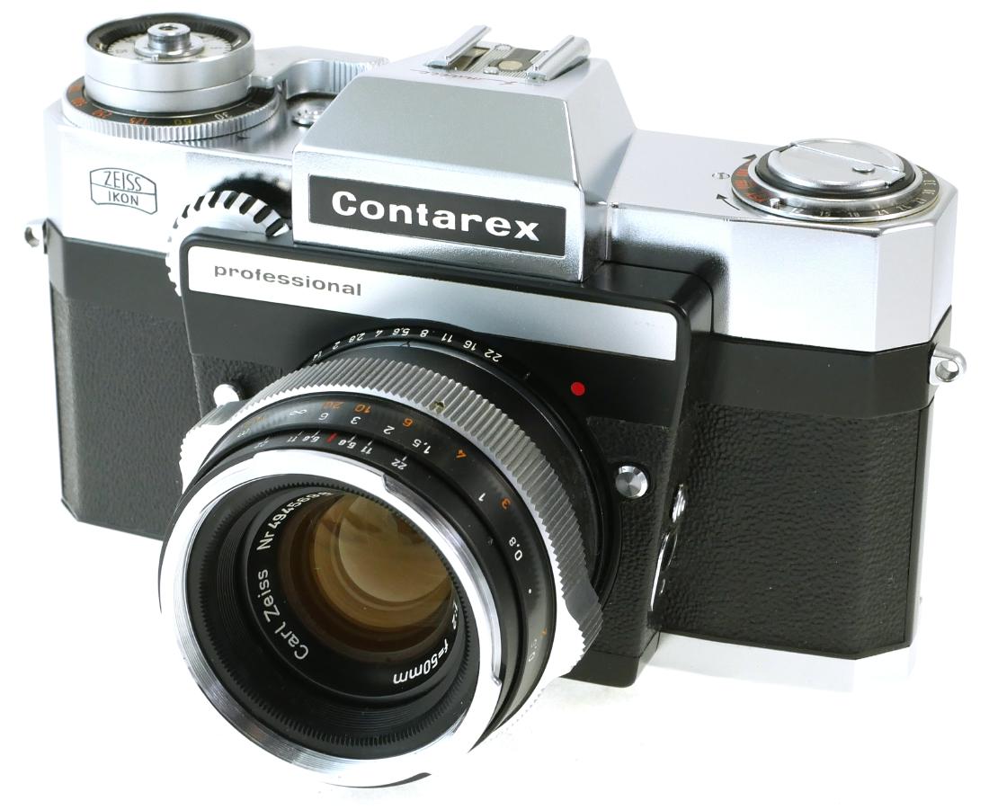 Rare Contarex P Zeiss Ikon SLR Camera: Contarex Professional 35mm SLR camera, with original paperwork, housed in a near perfect original box with Indy Car racing imagery. Built between June 1966 and March 1967, only about 1,500 of these ex