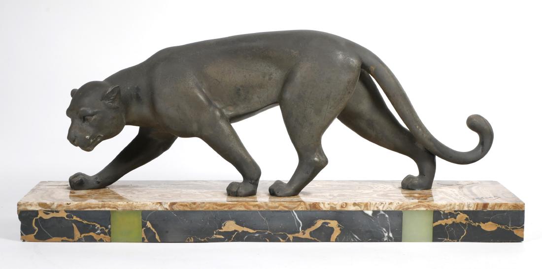 Art Deco Meland Panther Statue on Marble Base: White metal panther statue in black finish, mounted to tri-color marble base. Measures approximately 9" tall. Base measures 21" x 5.5" and is signed "Meland."