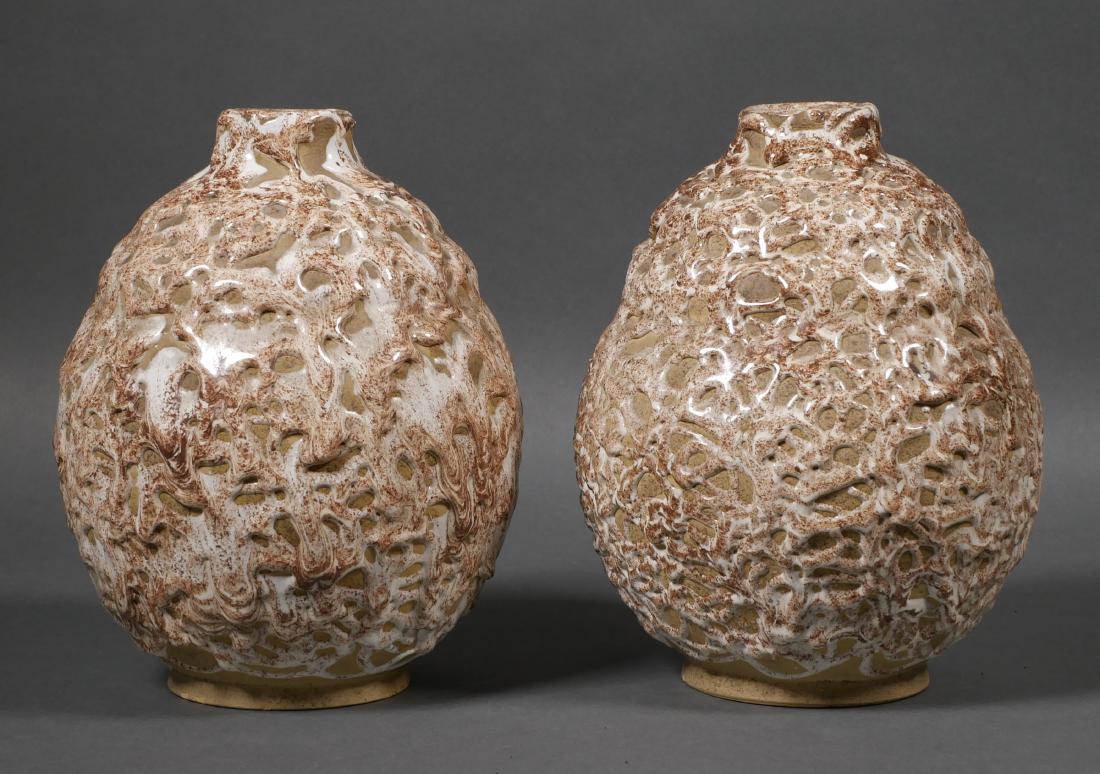 Pair French Modern Fat Lava Glazed Vases: Mid-Century Modernist Fat Lava glazed vases in brown and tan. Illegible French stamp under bases. Each measures 8" tall.