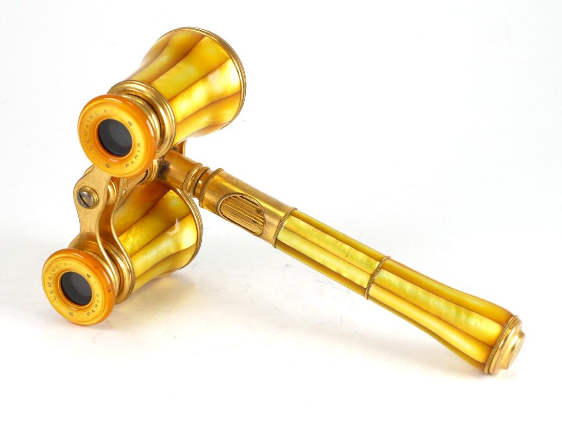 Lemaire Mother of Pearl Opera Glasses: MOP and gold opera glasses marked "Le Maire Fi Paris". Measures approx. 3-3/4" wide, 6" high including handle.