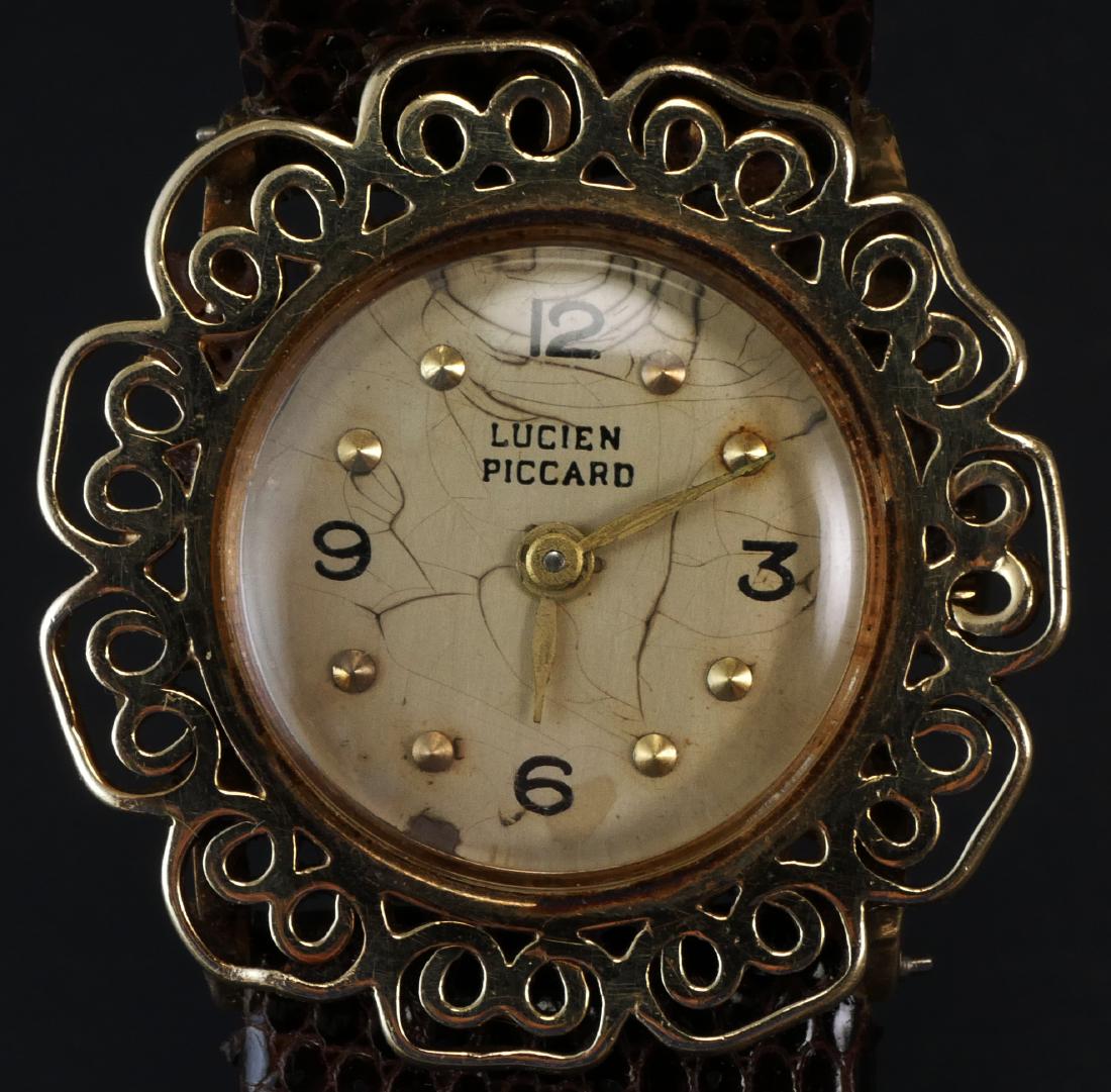 Lucien Piccard 14k Gold Ladies Watch: Vintage ladies wristwatch by Lucien Piccard. 14k (585) gold case. Lizard band.