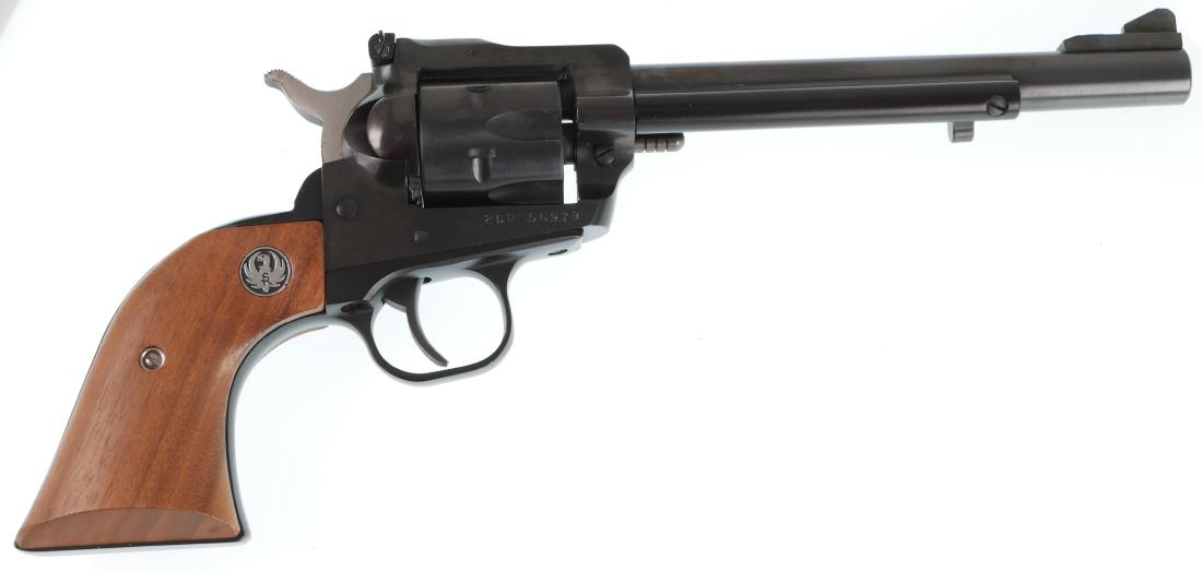Firearm: Ruger New Model Single-Six .22 Revolver: Single-action Ruger .22 cal revolver. Good condition. Two-screw safe model. One cylinder.