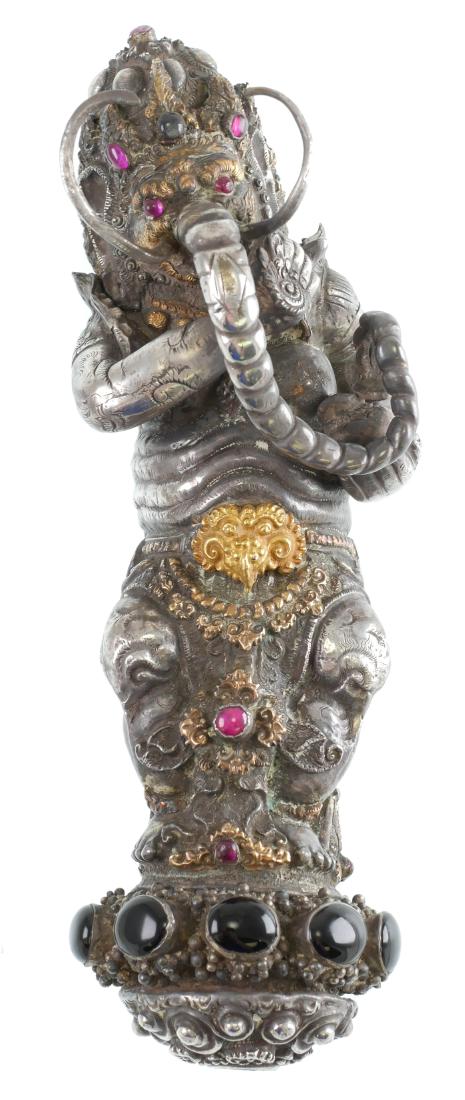 18C Kris Dagger Jeweled Gold Silver Handle: Important circa 18th-19th century Balinese silver and gold jeweled figural kris (keris) dagger handle, representing Bali's Hindu elephant deity, Ganesh (Ganesha). Set with large black gemstone cabocho