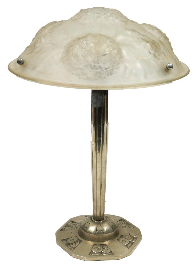 Silver Metal Art Deco Lamp Frosted Glass Shade: Muller Freres style art deco lamp in heavy silver metal with floral motif on base. Glass shade is thick, frosted and measures 14-1/2" across. Lamp measures 20" high. Re-wired for US 110v socket.