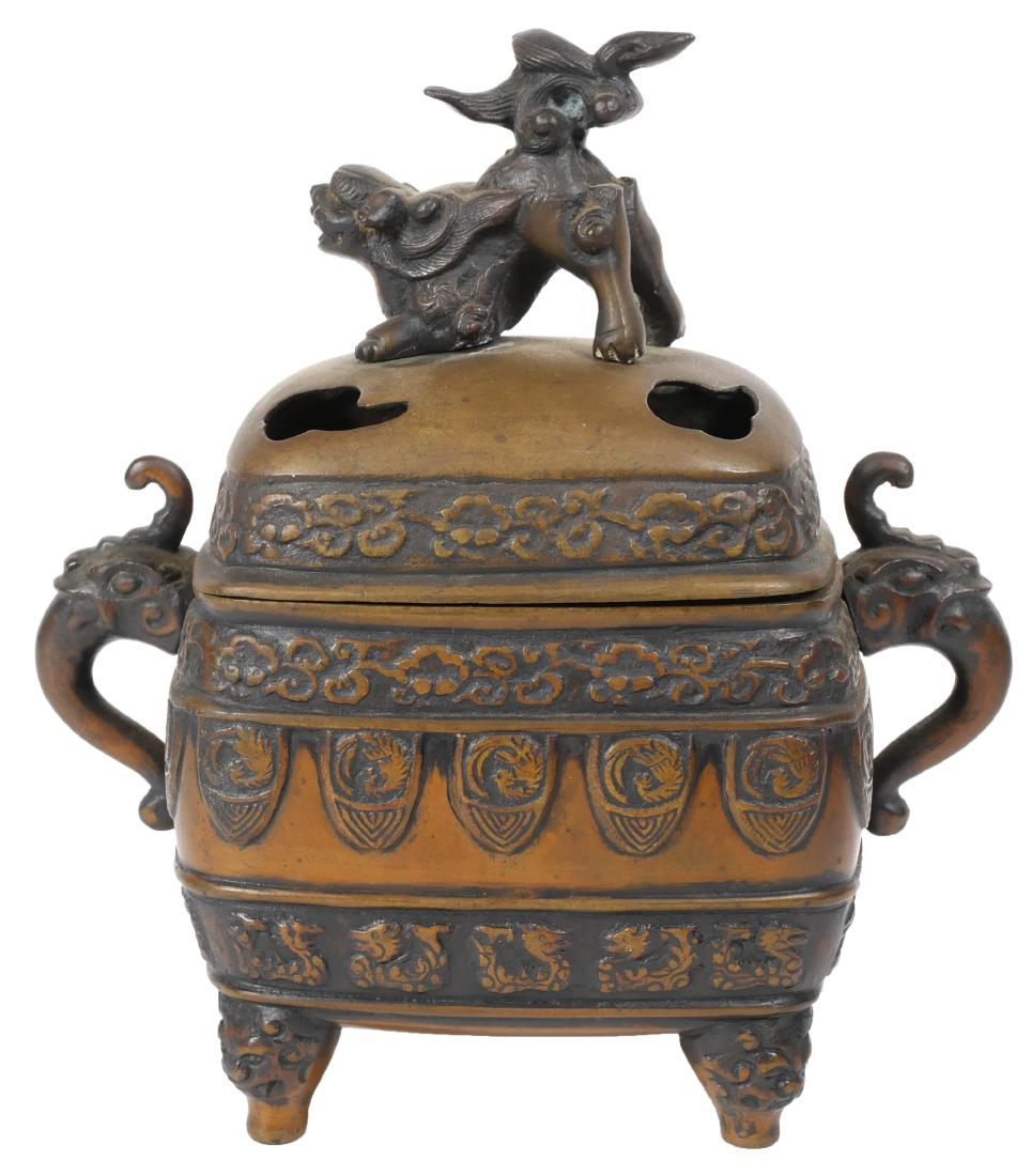 Antique Chinese Bronze Censer: Old Chinese bronze censer with foo dog finial and figural handles, and dragon and foliate motif bands. Measures 6-1/2" high.