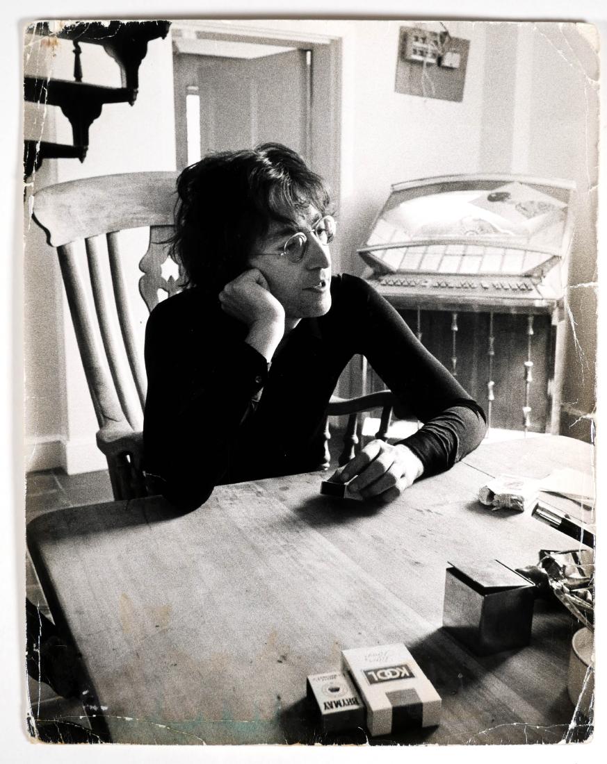 JOHN LENNON, Photograph by BARRIE WENTZELL: Rare 9" x 11-1/2" original photo of Beatles legend John Lennon with Yoko Ono, with stamp of Barrie Wentzell on verso. Stains and some creases, mostly visible on back.