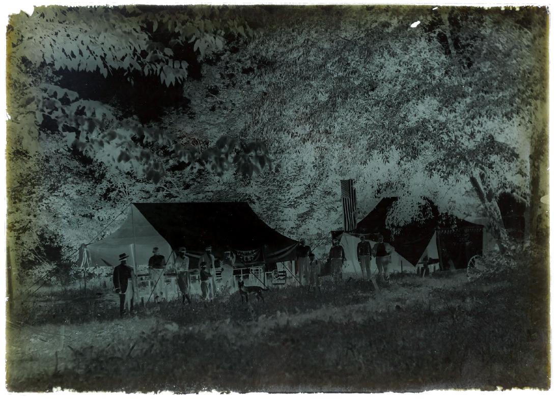 1915 Glass Negative FAMILY REUNION? 48-Star Flag: Two 5x7 glass negatives, circa 1910-1915, picturing the dining tent (so reads the helpful sign) at what appears to be a family get-together around 1915. (The staggered pattern of stars on 48-star US f