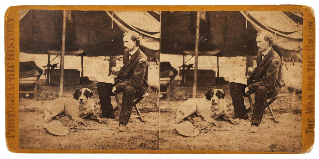 Mathew Brady GEORGE A CUSTER Stereo View: Stereograph view of General Custer with his dog, Virginia 1862. The back of stereoscopic card has a label indicating where the shot was taken, along with a canceled Internal Revenue proprietary tax st