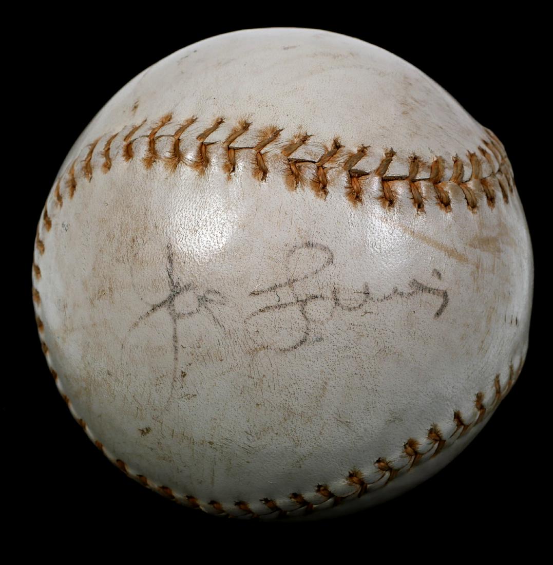 Rare JOE LOUIS Single Signed Softball: Vintage softball, bearing autograph of boxing legend Joe Louis. In the mid-1930s, Louis -- already well into his career as a boxer -- formed the Brown Bombers, a softball team, for which he played fir