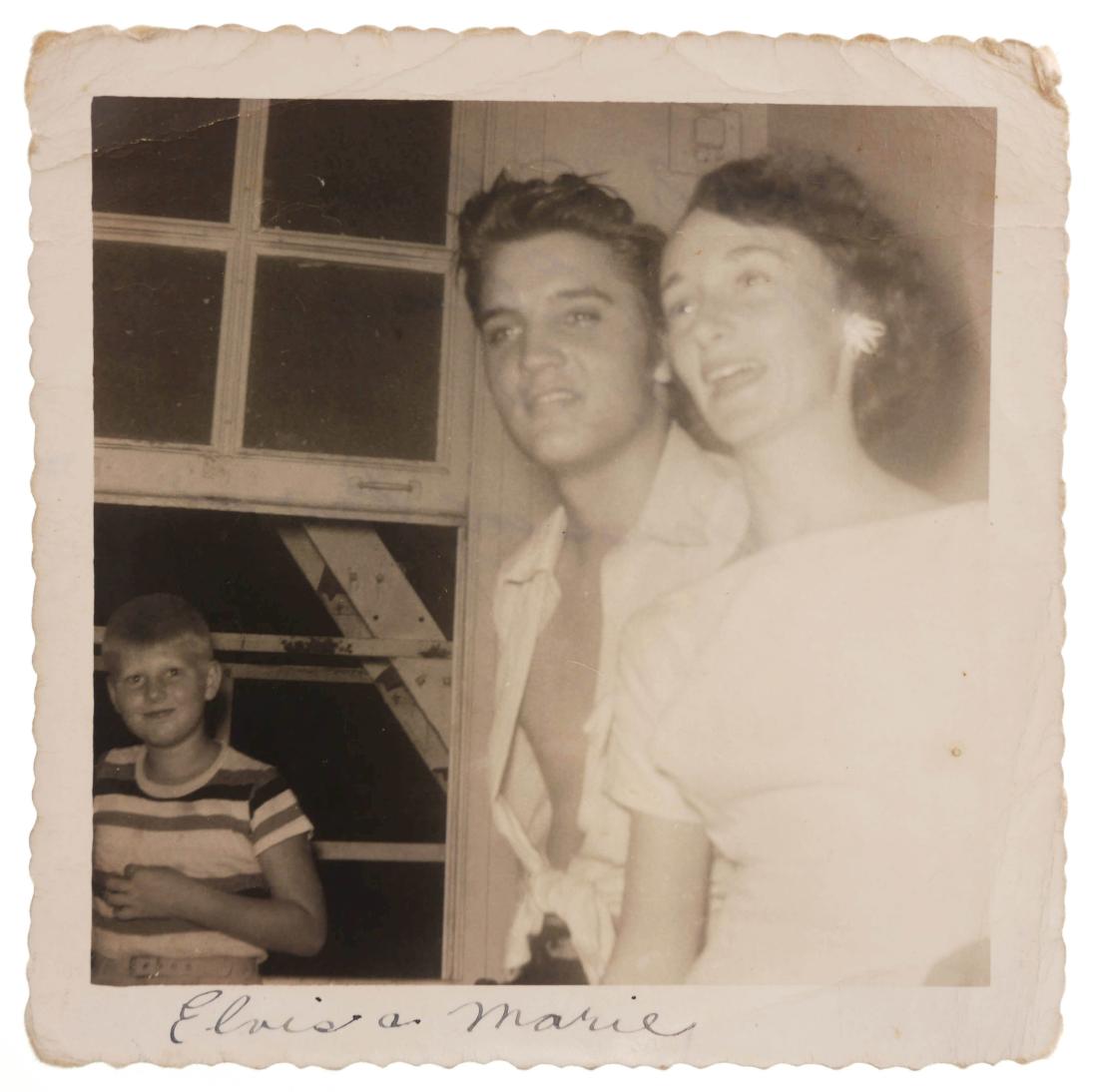 ELVIS PRESLEY Candid Photograph 1956: Never before published candid photo of Elvis, taken on August 7, 1956, in St. Petersburg, Florida. Elvis was playing that evening at St. Pete's Florida Theater, and several teenage fans snuck up the f