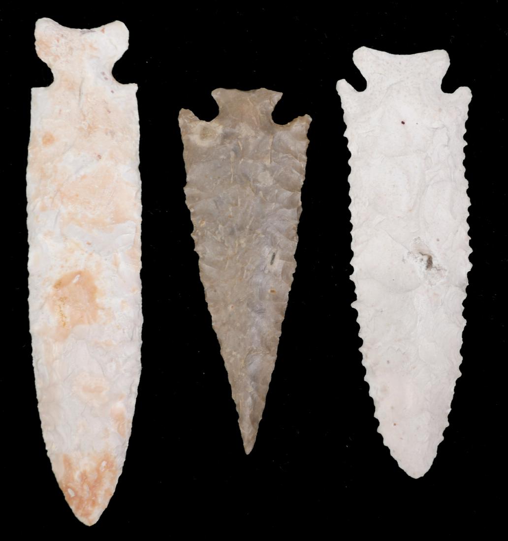3 Indian Arrowheads, Spear Points, Texas: Three fine Native American points, including one identified as an ensor spear point from Travis County, Texas. That one is 3-1/2" long, the other two 4" and 4-7/8". All are in fine condition and are g