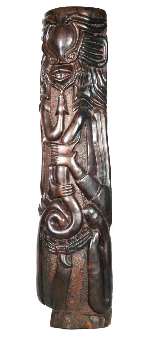 Tribal Totem Carving of Deity with Snake: Beautifully carved and detailed heavy hardwood carving of a figure grasping a serpent. Possibly a representation of Hindu deity Lord Hanuman, though the styling appears to be more African. Carving mea