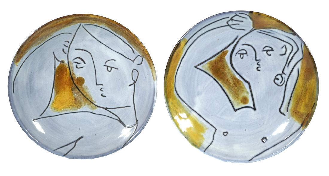 (2) JACQUES INNOCENTI, Ceramic Plates: Pair of complementary portrait plates by Jacques Innocenti, produced in Vallauris, France. Signed under each "Innocenti, Vallauris." Mid-Century Modern, produced circa 1950s. Plates show modernist sty