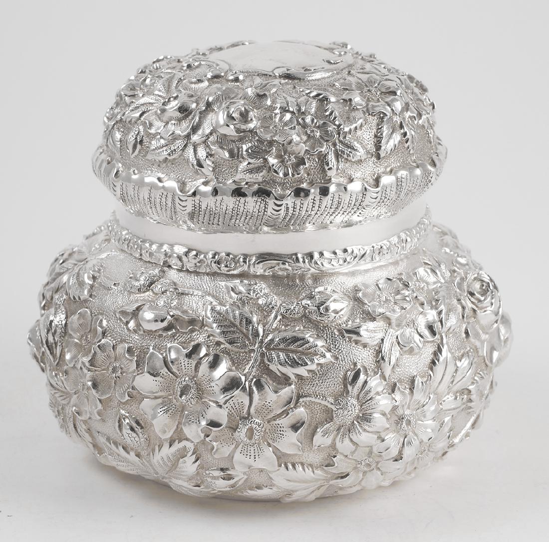 STIEFF Baltimore Rose Repousse Vanity Box: Dresser or vanity box, no monograms, by Steiff. Measures about 4-1/2" diameter and 3-5/8" high. Weighs about 7.1 Troy ounces.