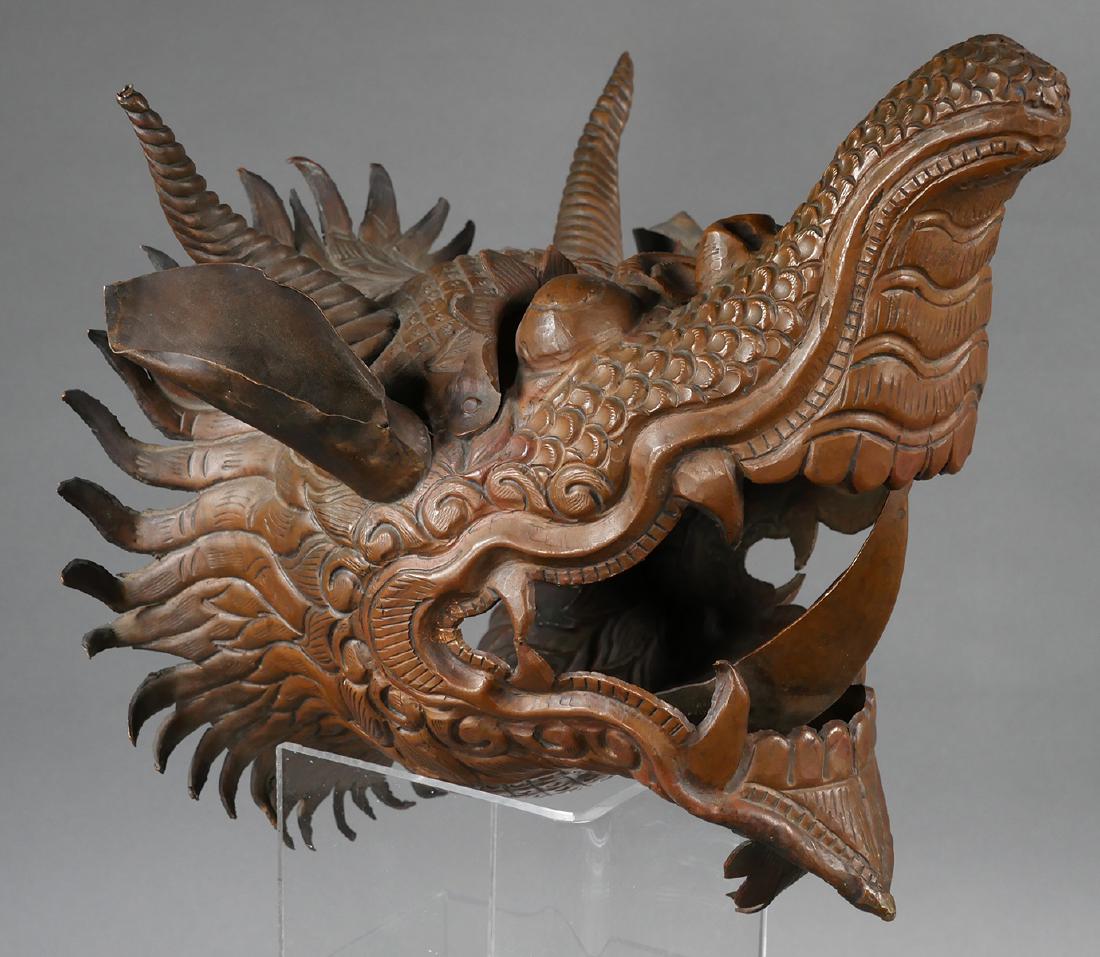Antique Thailand Copper Dragon Head: Hand tooled copper Asian horned dragon head, possibly Thai. Measures 9 1/2" high x 10 1/2" deep.