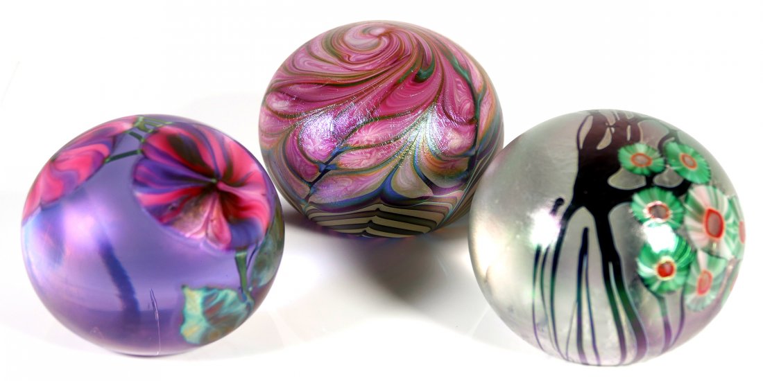 3 LOTTON Iridescent Art Glass Paperweights: Three Lotton Studio paperweights, dated 1994, 1997 and 2004, signed by Daniel, Jeremy and David Lotton. Each measures a little over 3" in diameter. Fine condition, with no damage.