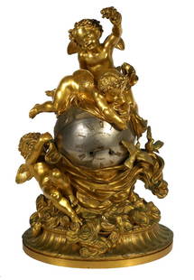 GAUTIER Gilt Bronze Clock, Fine Detail: Large mid 19C gilt bronze clock by Gautier, Paris. Features cherubs surrounding a center sphere, which has a band representing the Zodiac. Hour and minute hands are snakes. Measures 24" tall. Very